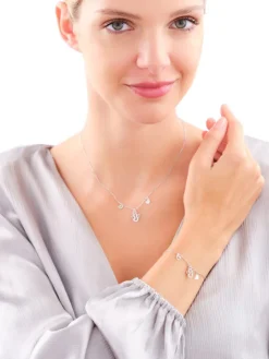 Naszyjnik srebrny z cyrkoniami - aniołek, serca