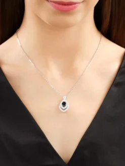 Naszyjnik z białego złota z brylantami i szafirem - próba 750