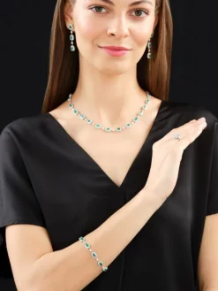 Naszyjnik z białego złota z brylantami i szmaragdami - próba 750