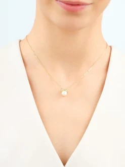 Naszyjnik z mosiądzu pozłacany z cyrkoniami i perłami - kokardki