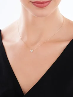 Naszyjnik z żółtego i białego złota z brylantem - serce - 0,04 ct - próba 585