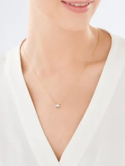 Naszyjnik z żółtego i białego złota z brylantem - koła - 0,06 ct - próba 585