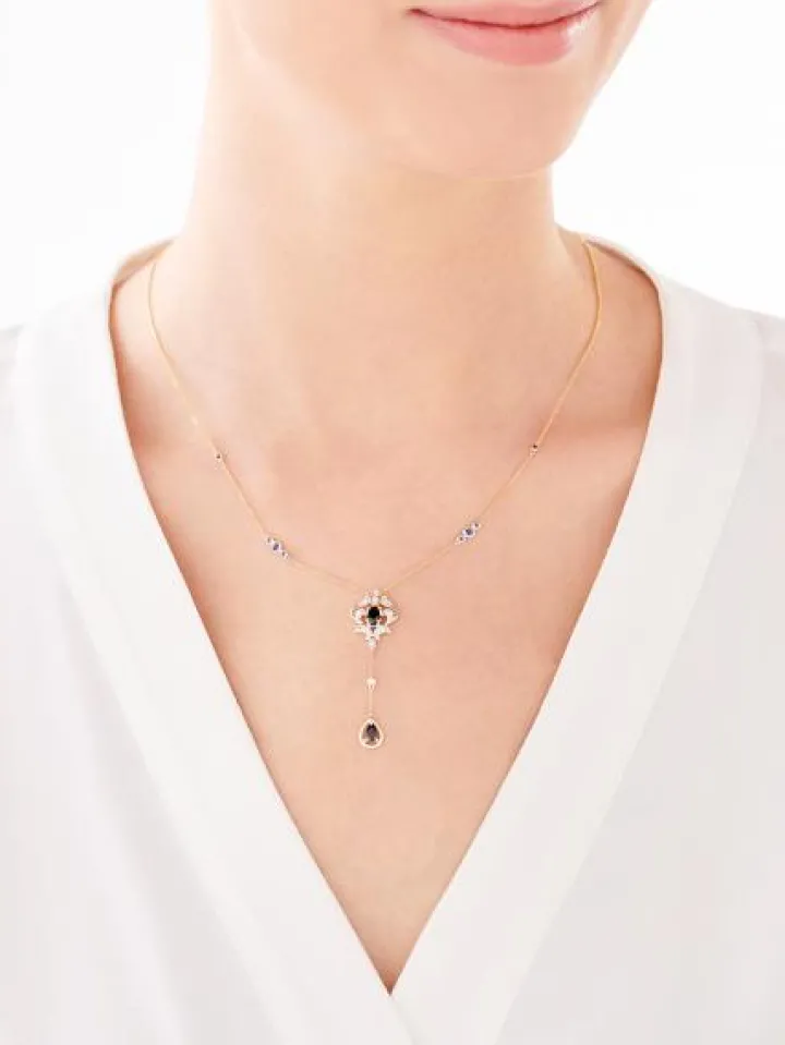 Naszyjnik z żółtego złota z brylantami i szafirami - próba 585