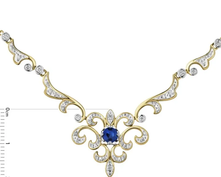Naszyjnik z żółtego złota z brylantami i szafirem - próba 585