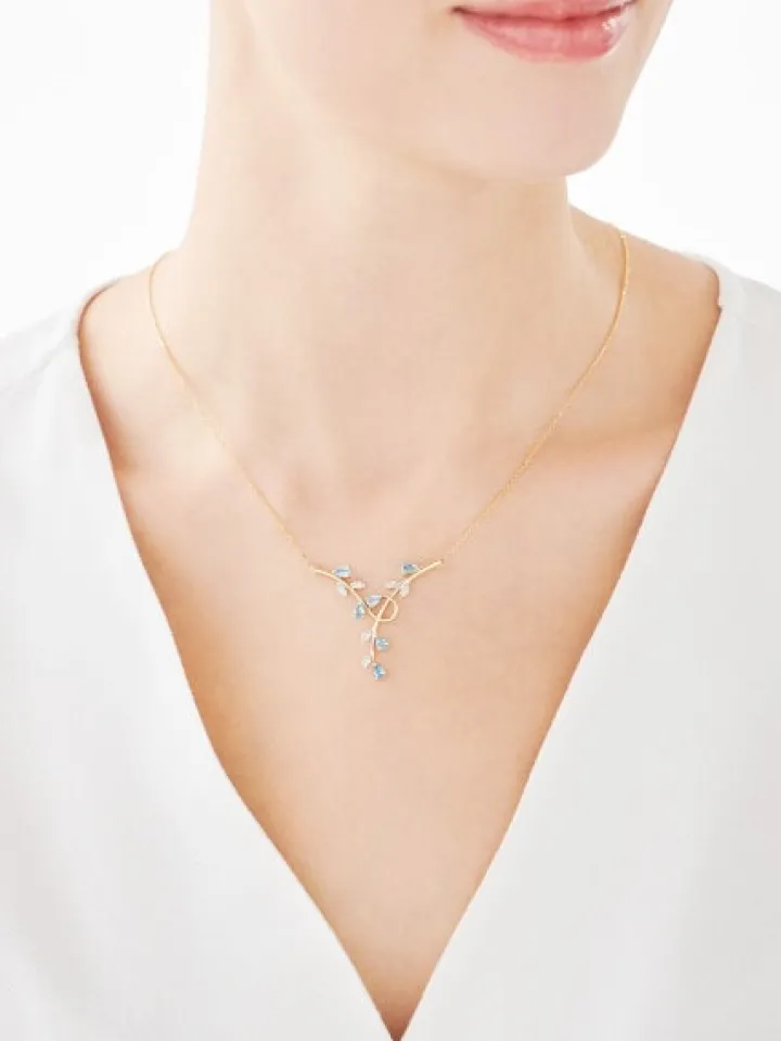 Naszyjnik z żółtego złota z diamentami i topazami - liście - próba 375