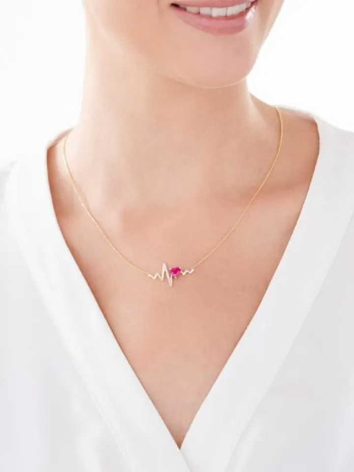 Naszyjnik z żółtego złota z diamentami i rubinem syntetycznym - EKG serca - próba 375