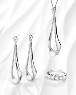 Pierścionek srebrny z perłami i cyrkoniami