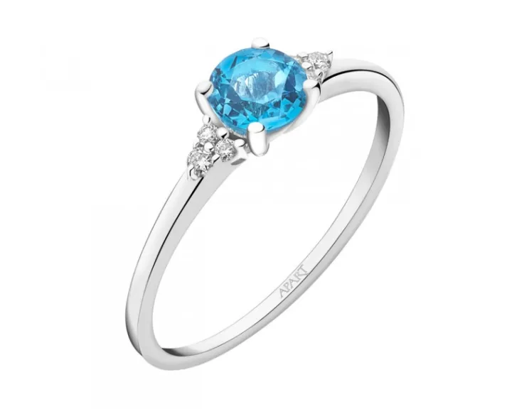 Pierścionek z białego złota z brylantami i topazem - próba 585