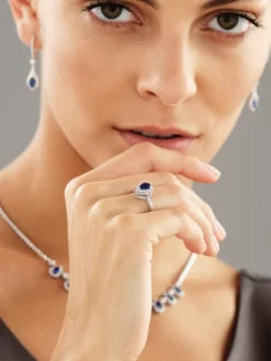 Pierścionek z białego złota z brylantami i szafirem - próba 585