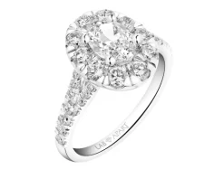 Pierścionek z białego złota z diamentami i topazem London Blue - próba 585