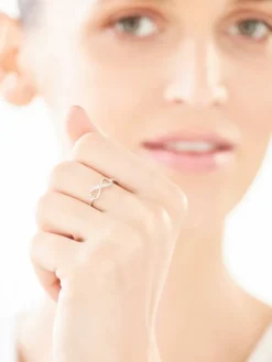 Pierścionek z białego złota z diamentami - serce, nieskończoność - 0,02 ct - próba 375