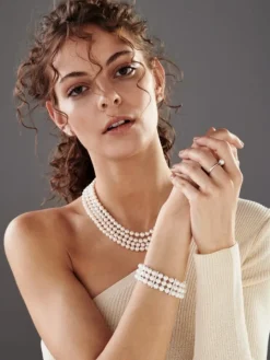 Pierścionek z białego złota z brylantami i perłą - próba 375