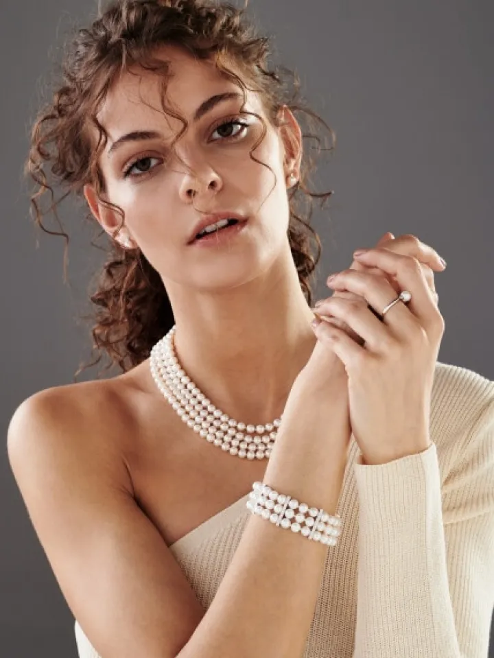 Pierścionek z białego złota z brylantami i perłą - próba 375