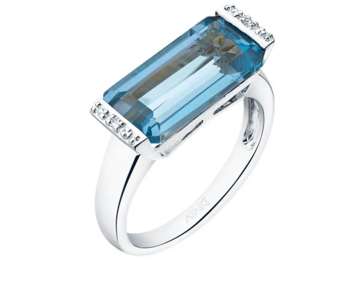 Pierścionek z białego złota z diamentami i topazem - próba 585