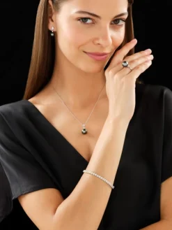 Pierścionek z białego złota z brylantami i perłą Tahiti - próba 585