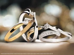 Pierścionek z żółtego i białego złota z brylantem - 0,04 ct - próba 585