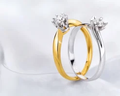 Pierścionek z żółtego i białego złota z brylantem - SI2/H - 0,28 ct - próba 585