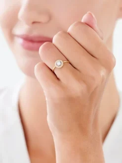 Pierścionek z żółtego i białego złota z diamentami - 0,22 ct - próba 585