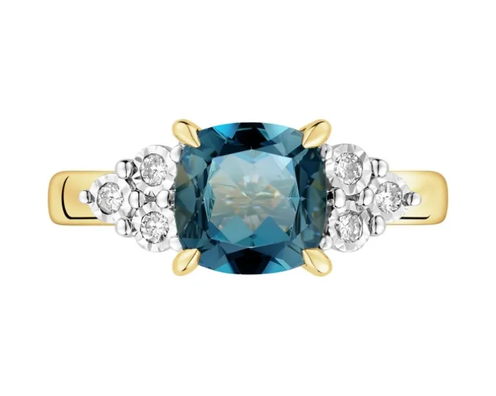 Pierścionek z żółtego i białego złota z brylantami i topazem London Blue - próba 585