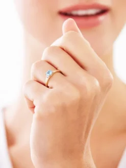 Pierścionek z żółtego złota z diamentami i topazem - próba 375