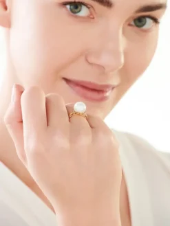 Pierścionek z żółtego złota z diamentami i perłą - próba 585