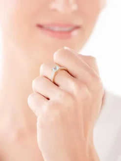 Pierścionek z żółtego złota z diamentami i topazem - próba 585