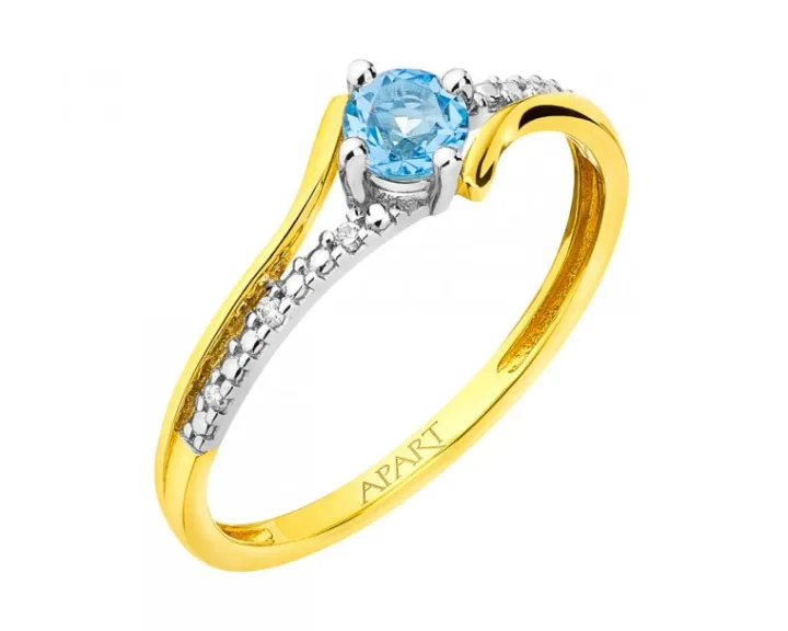 Pierścionek z żółtego złota z brylantami i topazem - próba 375