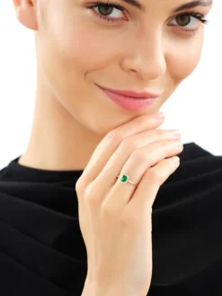 Pierścionek z żółtego złota z diamentami i szmaragdem syntetycznym - próba 375