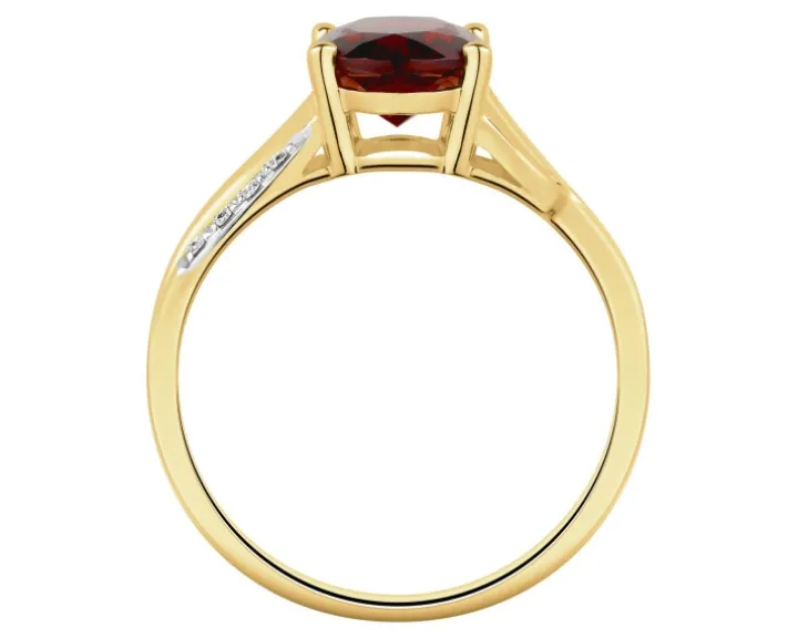 Pierścionek z żółtego złota z diamentami i topazem - próba 375