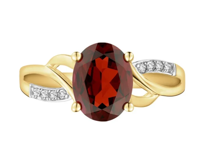 Pierścionek z żółtego złota z diamentami i topazem - próba 375