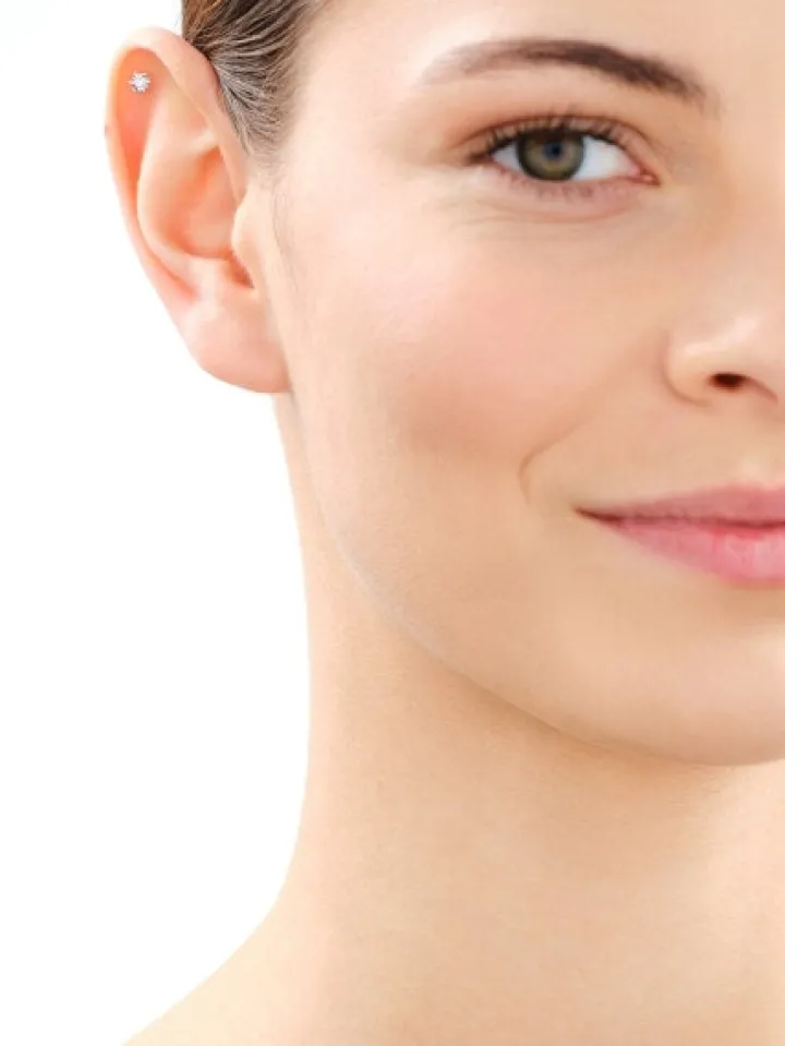 Pojedynczy kolczyk z żółtego i białego złota z brylantem do piercingu - 0,02 ct - próba 585