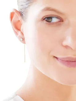 Pojedynczy kolczyk z żółtego i białego złota z brylantem - 0,01 ct - próba 375