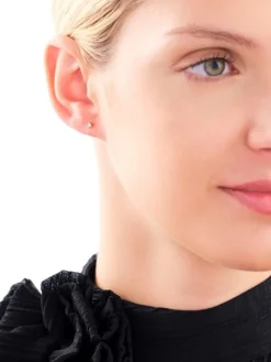 Pojedynczy kolczyk z żółtego i białego złota z brylantem - 0,01 ct - próba 585