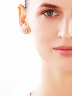 Pojedynczy kolczyk z żółtego i białego złota z brylantem - 0,02 ct - próba 375