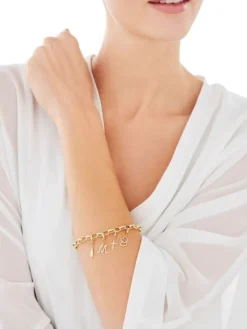 Zawieszka charms z żółtego złota z diamentem - serca - 0,003 ct - próba 375