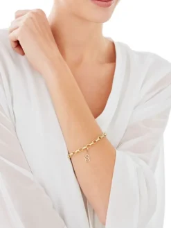 Zawieszka charms z żółtego złota z diamentem - serca - 0,003 ct - próba 375