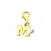 Zawieszka charms z żółtego złota z diamentem - litera M, serce - 0,004 ct - próba 375