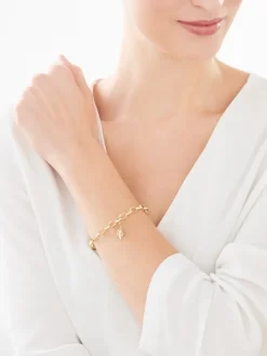 Zawieszka charms z żółtego złota z diamentem - monstera - 0,005 ct - próba 375