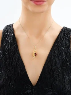 Zawieszka srebrna z bursztynem - konik morski