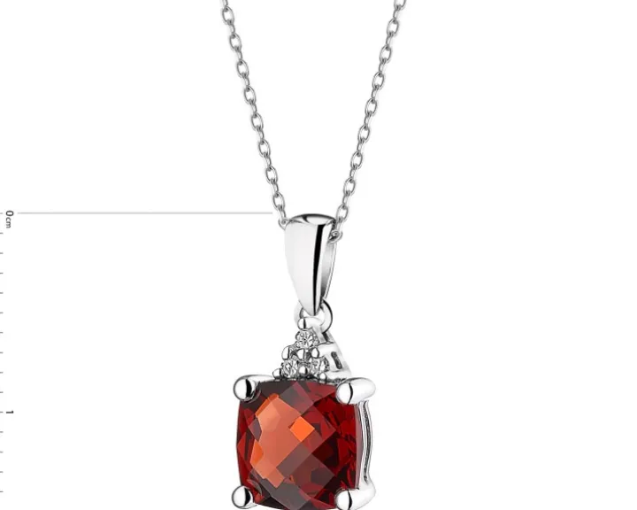 Zawieszka z białego złota z diamentami i granatem - próba 585