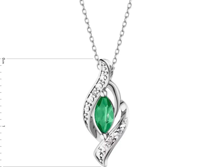 Zawieszka z białego złota z diamentami i szmaragdem - próba 585