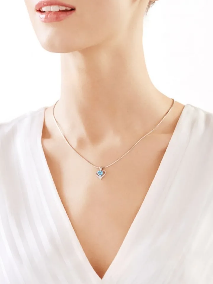 Zawieszka z białego złota z diamentem i topazem - serce - próba 585