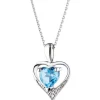 Zawieszka z białego złota z diamentem i topazem - serce - próba 375