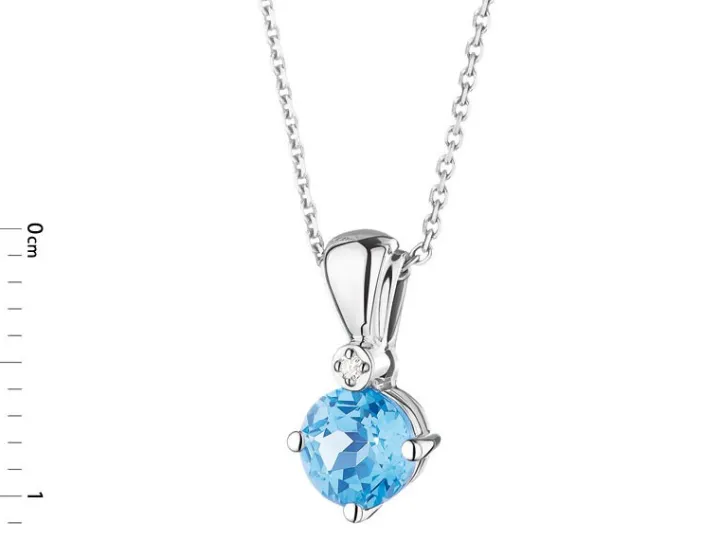 Zawieszka z białego złota z diamentem i topazem - próba 375