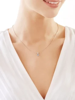 Zawieszka z białego złota z diamentem i topazem - próba 375