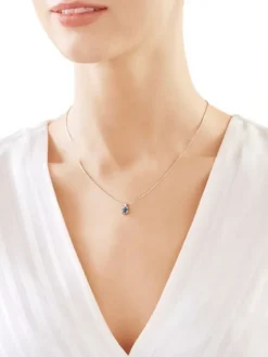 Zawieszka z białego złota z diamentem i topazem London Blue - próba 375