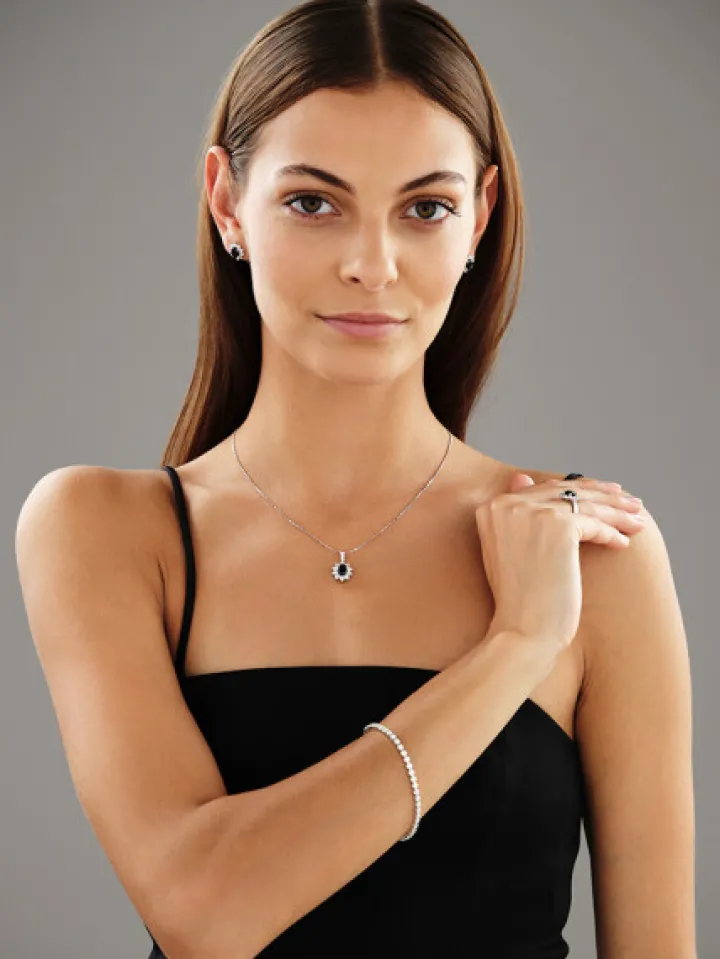 Zawieszka z białego złota z brylantami i szafirem - próba 585