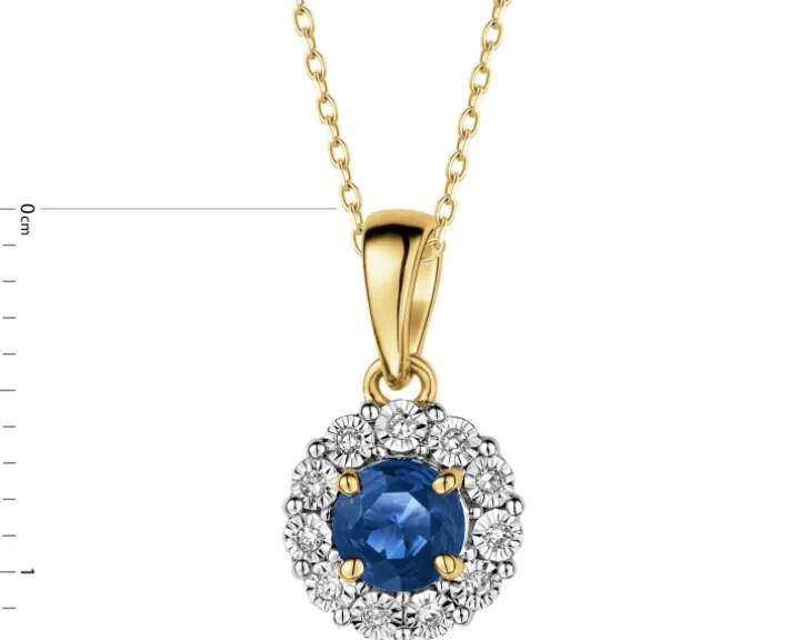 Zawieszka z żółtego i białego złota z diamentami i szafirem - próba 585
