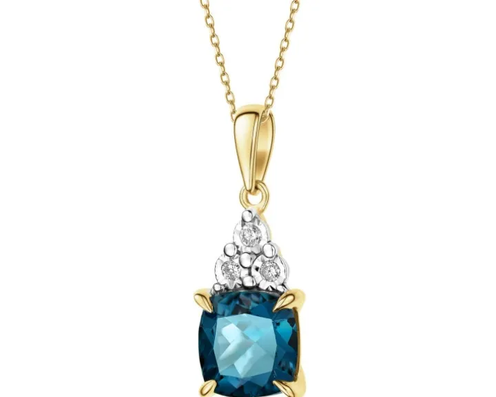 Zawieszka z żółtego i białego złota z brylantami i topazem London Blue - próba 585