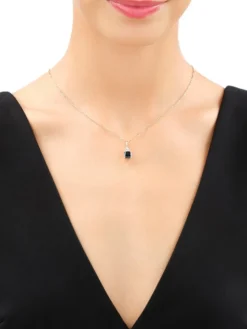 Zawieszka z żółtego i białego złota z brylantami i topazem London Blue - próba 585